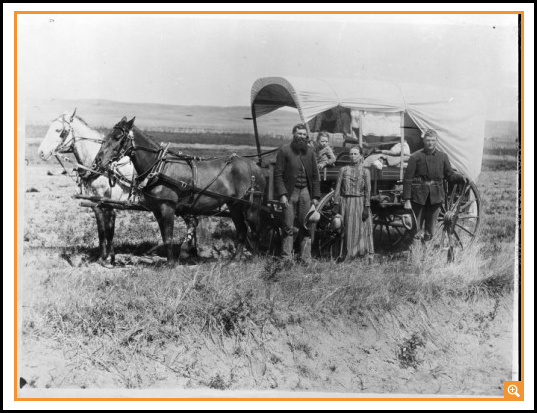Covered Wagon Photograph of a Family with Their Covered Wagon During the Great Western Migration, 1866