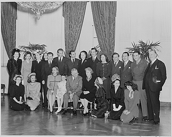 Photograph of movie stars posing with President Truman and his family at the White House., 01/28/1946