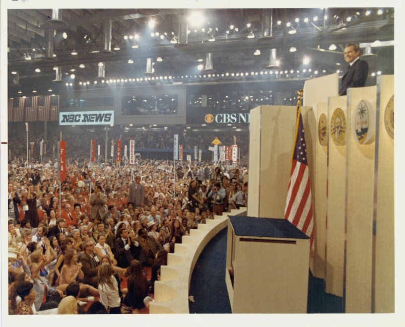 Richard Nixon standing at podium during campaign, 1972